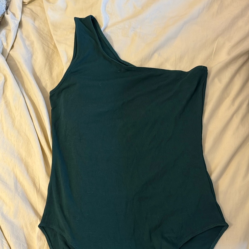 Green one shoulder body suit